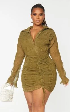 Plus Olive Plisse Textured Ruched Shirt Dress -Serenova Dresses Shop e2363419fe4e49fbc05ec46cdf5ae626d99df661 cmu4840 4