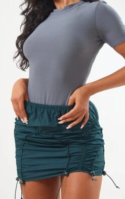 Dark Green Parachute Toggle Hem Mini Skirt -Serenova Dresses Shop f678e04d13ab22426139bc260e93f254605ef41c cne3879 5